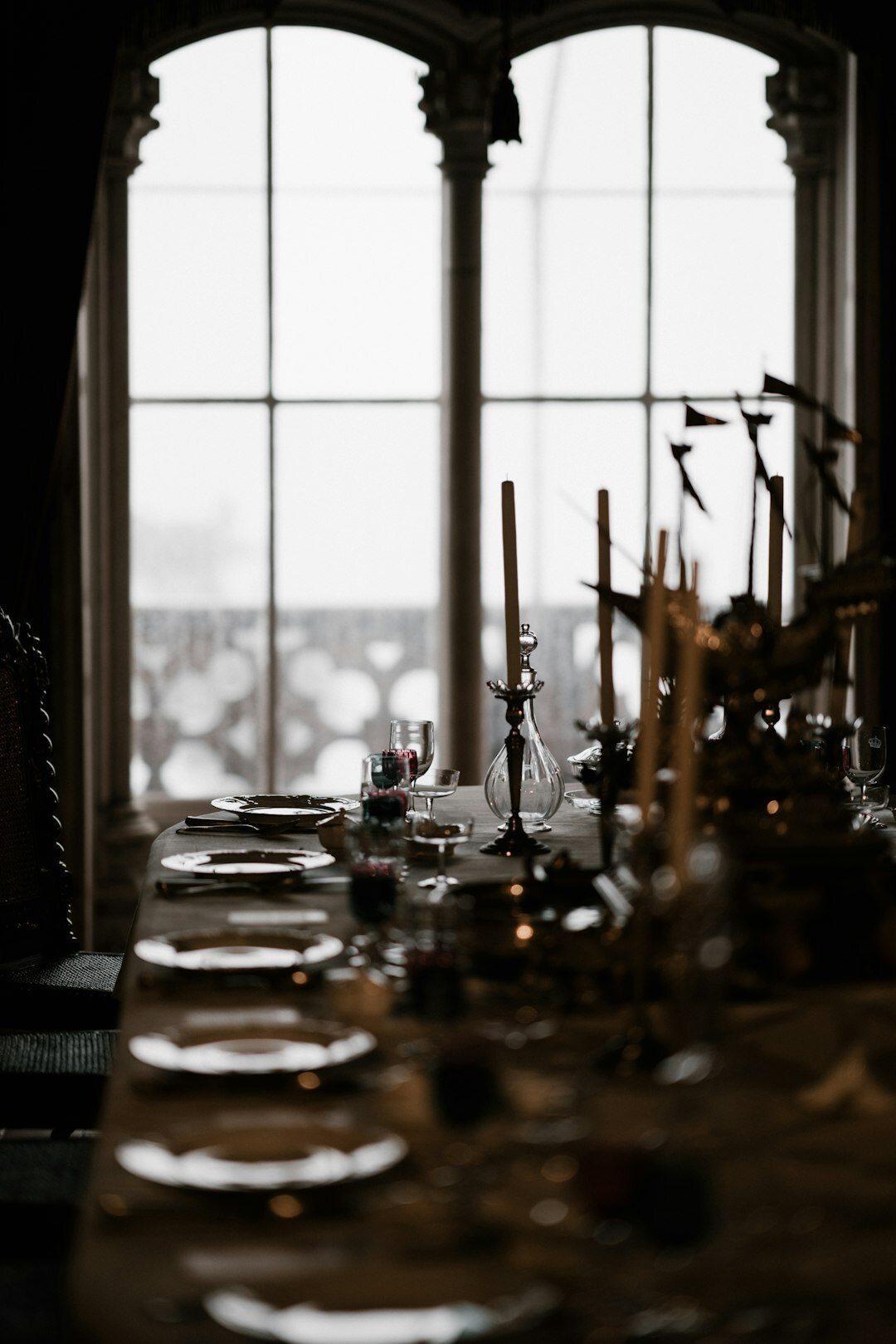 Elegant fine dining restaurant table setting with candles